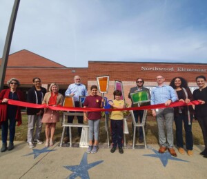 Ribbon cutting. "Unity" by Nathan Pierce. Located at Northwood Elementary.  Sponsored by Northwood Foundation.